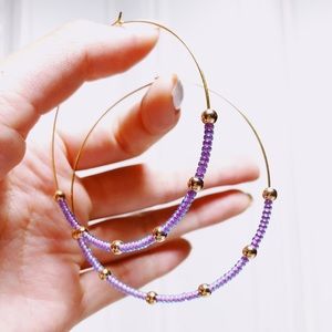 Dainty gold and duo-chrome handmade hoops.